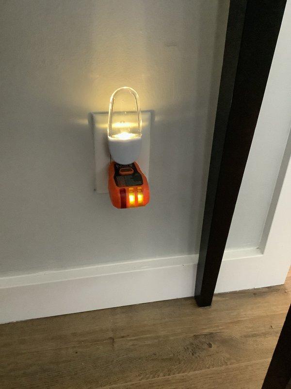 Completed comprehensive GFCI protection upgrade throughout the property. Installed bell box on exposed wire above garage door with weatherproof blank cover. Replaced faulty weather-resistant GFCI receptacle and cover at back patio door after confirming proper voltage supply. Upgraded two garage outlets to GFCI receptacles with line/load configuration. Removed existing washing machine outlet and installed 4x4 metal junction box with new GFCI outlet. Replaced three circuit breakers in main panel with GFCI breakers: 15-amp breaker at position 15, 20-amp breaker at position 16, and 15-amp breaker at position 28 to provide ground fault protection for all basement outlets. All installations tested and verified operational.