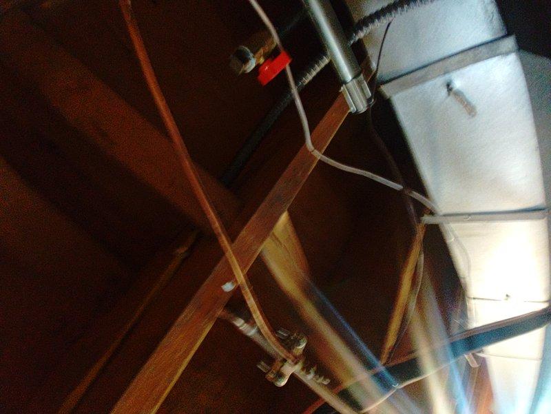 Installed two dedicated 110V electrical circuits to support HVAC and water heating systems. First circuit powers the furnace unit, while the second circuit serves the power vent assembly for the water heater. Routed electrical wiring through exposed wall studs and ceiling joists, securing all conduit and cabling per code requirements. All connections completed and circuits tested for proper operation.