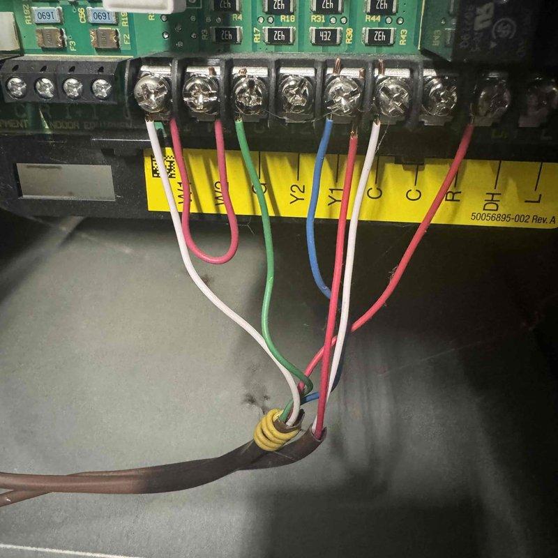 Replaced defective outdoor reversing valve on heat pump system. Evacuated refrigeration system, pulled vacuum to proper specifications, and recharged unit with fresh refrigerant to manufacturer specifications. Verified all electrical connections at control board terminal strip and confirmed proper system operation upon completion.