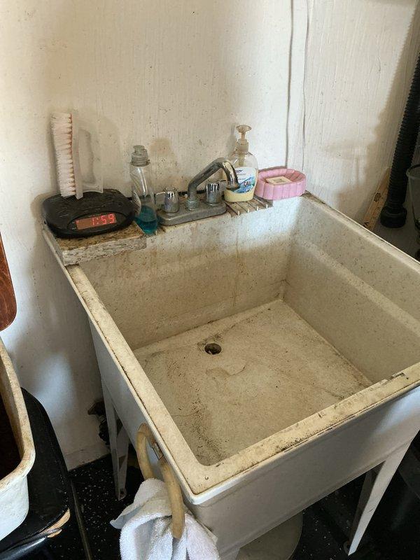 Completed installation of two new toilets in residential bathroom, including removal of existing fixtures, proper seating and sealing of new two-piece elongated bowl units, and connection to existing water supply lines. Installed new kitchen faucet with complete replacement of mounting hardware and supply line connections. Replaced worn washers in multiple fixtures throughout the residence to eliminate leaks and restore proper water flow control. Installed new drain assembly with appropriate sealing to ensure watertight operation. All installations tested for proper function, water pressure, and leak-free operation upon completion.