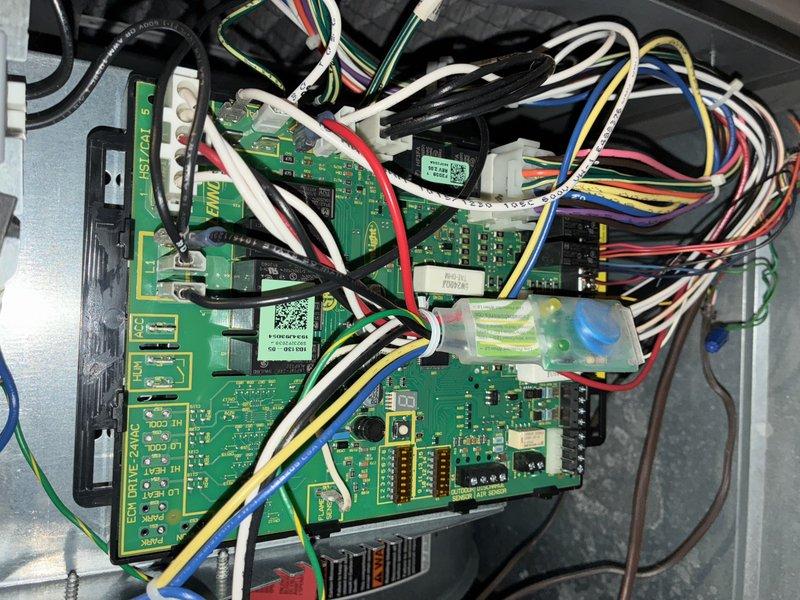 Completed comprehensive tune-up service on two air conditioning systems, performing detailed inspection of control boards, electrical connections, and blower assemblies. All circuit board connections, wiring harnesses, and internal components were examined and found to be in proper working condition, with both units now operating at optimal performance levels.