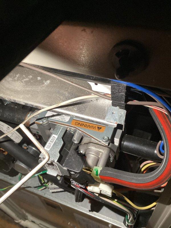 Completed MVP maintenance heating visit on residential HVAC system. Performed comprehensive inspection of furnace components including blower motor assembly, electrical connections, and internal wiring. Filter showed significant dust and debris accumulation on ridged slats and was heavily soiled throughout, requiring replacement to maintain proper airflow and system efficiency. Inspected blower motor housing, verified all electrical connections were secure, and confirmed proper wire routing through equipment. All mechanical components operating within normal parameters upon completion of maintenance service.