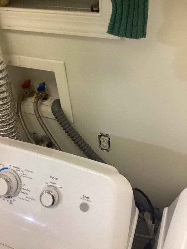 Responded to no power complaint affecting washer and dryer outlet. Upon arrival, inspected electrical panel and identified tripped circuit breaker supplying the laundry room receptacle. Reset breaker, verified proper voltage at outlet, and tested washer operation to confirm power restoration. All circuits functioning normally upon completion.