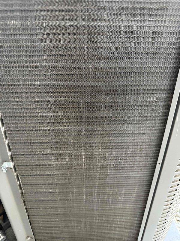 Completed comprehensive maintenance visit on Lennox outdoor condensing unit. Performed standard preventive maintenance protocol including inspection of condenser coil, which showed moderate accumulation of dirt and debris between fins. Unit is properly installed on concrete pad with gravel drainage bed, all electrical and refrigerant lines secure and in good condition. System operational and ready for cooling season.