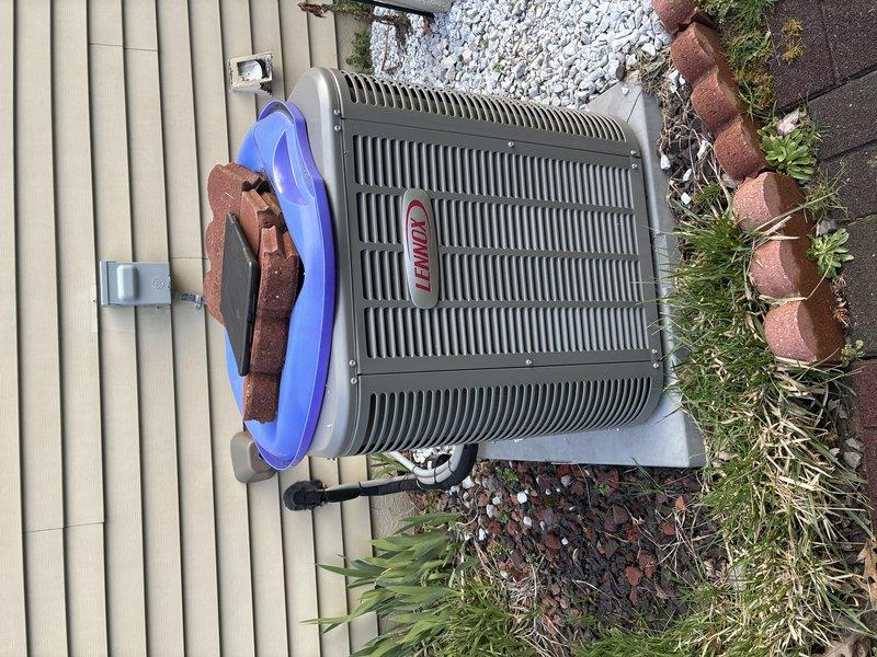Completed MVP recurring cooling maintenance visit on Lennox outdoor condensing unit. Performed standard preventative maintenance inspection including visual assessment of unit condition, refrigerant lines, electrical connections, and surrounding area. Unit operating within normal parameters. Documented equipment condition with photographs showing proper installation on concrete pad with adequate clearance and landscaping maintenance around perimeter.