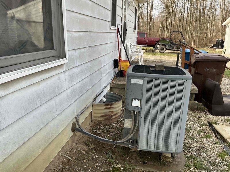 Conducted comprehensive on-site evaluation for complete HVAC system replacement, assessing existing electric furnace and heat pump equipment. Photographed current outdoor condensing unit and installation conditions, documented refrigerant line connections, equipment placement, and electrical configuration. Provided detailed replacement estimate including heat pump system specifications and coordinated additional quote for electrical panel upgrade and rewiring to support new equipment installation requirements.