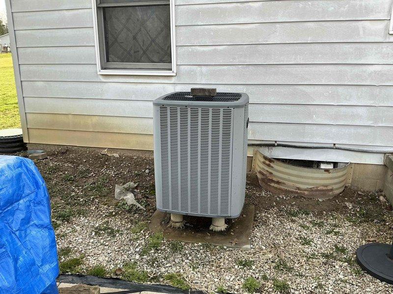 Conducted comprehensive on-site evaluation for complete HVAC system replacement, assessing existing electric furnace and heat pump equipment. Photographed current outdoor condensing unit and installation conditions, documented refrigerant line connections, equipment placement, and electrical configuration. Provided detailed replacement estimate including heat pump system specifications and coordinated additional quote for electrical panel upgrade and rewiring to support new equipment installation requirements.