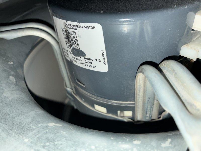 Completed comprehensive furnace tune-up including inspection of blower motor assembly with programmable ECM motor and air filtration system. Filter showed moderate dust accumulation and was inspected as part of routine maintenance; all mechanical components operating within normal parameters and system tested for proper airflow and functionality.