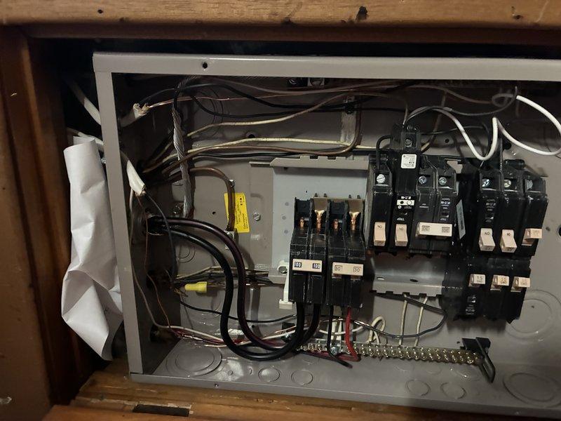 Replaced an inaccessible GFCI outlet located behind a bed with a standard three-prong outlet and installed a GFCI circuit breaker at the main electrical panel to provide ground-fault protection for the ungrounded circuit. This upgrade ensures GFCI protection remains easily accessible for resetting without requiring furniture to be moved, while maintaining code-compliant three-prong outlet functionality throughout the circuit that lacks an equipment ground conductor.