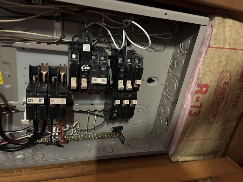 Replaced an inaccessible GFCI outlet located behind a bed with a standard three-prong outlet and installed a GFCI circuit breaker at the main electrical panel to provide ground-fault protection for the ungrounded circuit. This upgrade ensures GFCI protection remains easily accessible for resetting without requiring furniture to be moved, while maintaining code-compliant three-prong outlet functionality throughout the circuit that lacks an equipment ground conductor.