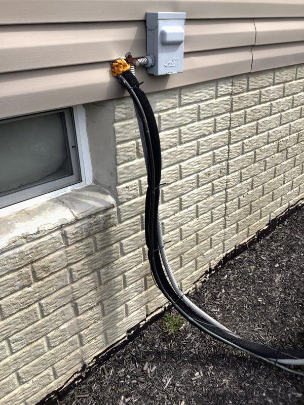 Conducted comprehensive site evaluation for complete furnace and air conditioning system replacement. Assessed existing HVAC infrastructure including exterior disconnect box, refrigerant line set with brass flare connections, basement ductwork labeled for second floor zoning, and Honeywell humidifier integration to provide accurate equipment sizing and installation specifications for replacement estimate.