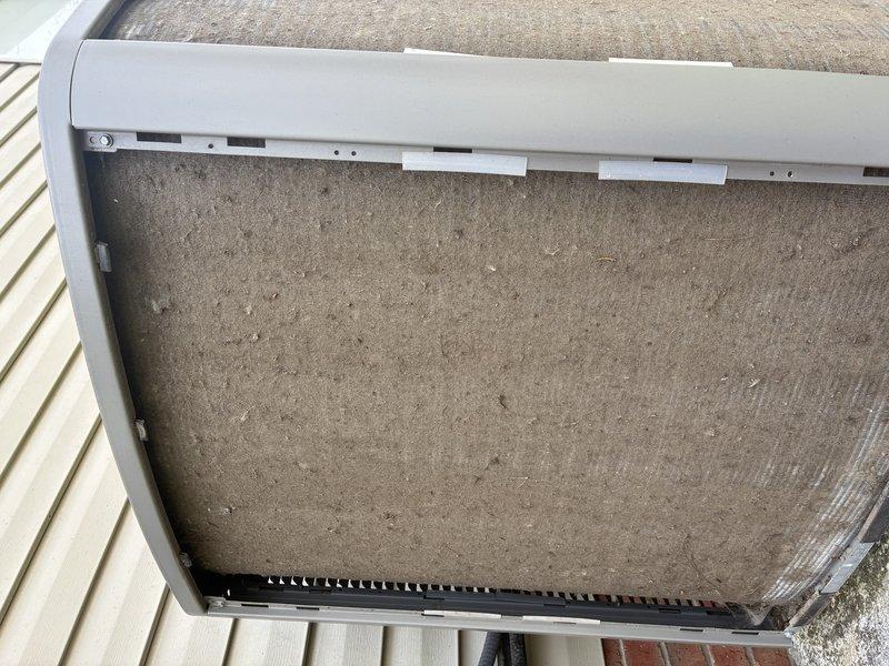 Completed comprehensive A/C tune-up on 8-9 year old system per seasonal maintenance request. Inspected and documented heavily soiled air filter requiring replacement due to significant dust and debris accumulation. Performed electrical component inspection revealing capacitor and contactor in operational condition, with noted dirt buildup in control panel requiring cleaning for optimal performance.