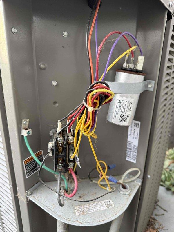 Completed early season air conditioning tune-up on residential system. Upon inspection, discovered evaporator coil heavily contaminated with dust and debris accumulation, significantly restricting airflow and reducing system efficiency. Cleaned evaporator coil thoroughly, inspected electrical connections and capacitor in control panel, verified all wiring secure and properly terminated. System operational following service.