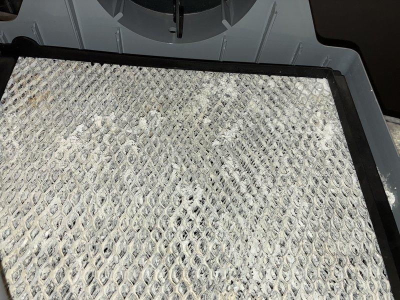 Completed comprehensive furnace tune-up and system inspection. Identified heavily soiled air filter with significant dust and debris accumulation throughout the mesh structure, restricting proper airflow to the system. Recommended filter replacement to restore optimal system performance and indoor air quality.