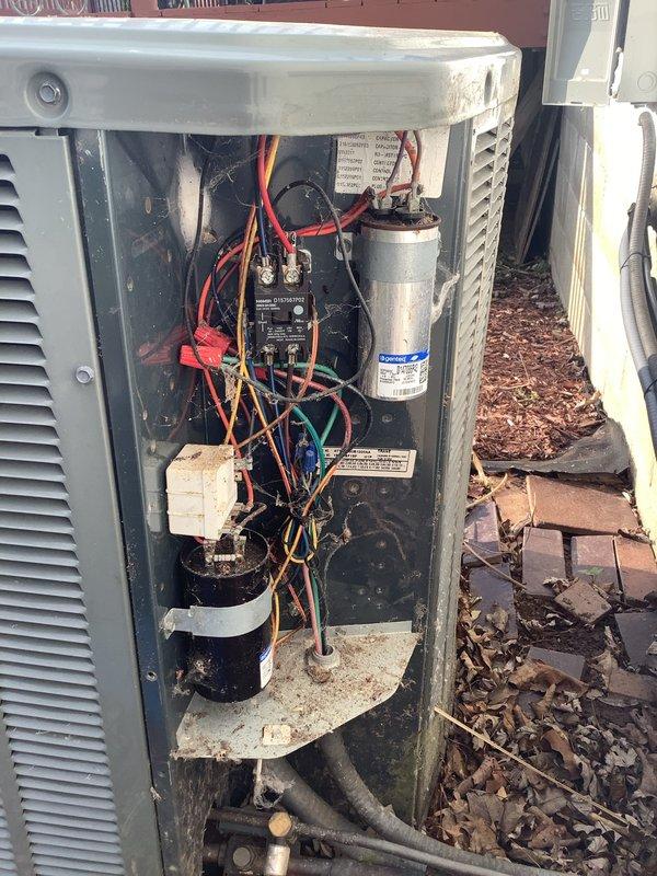 Completed comprehensive furnace tune-up on outdoor HVAC unit, inspecting electrical connections, capacitor, contactors, and refrigerant lines. Documented existing dirt accumulation on condenser coil and general weathering of components consistent with outdoor installation. System operational with membership offer presented for ongoing maintenance services.