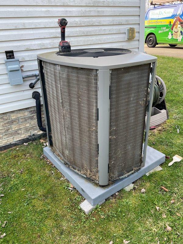 Completed MVP Cooling Visit maintenance on residential air conditioning system. Performed comprehensive inspection of outdoor condenser unit, cleaned protective metal grille guards that showed dirt and debris accumulation, and verified proper operation of all components. Confirmed electrical connections, refrigerant line integrity, and overall system functionality with unit operating within normal parameters.