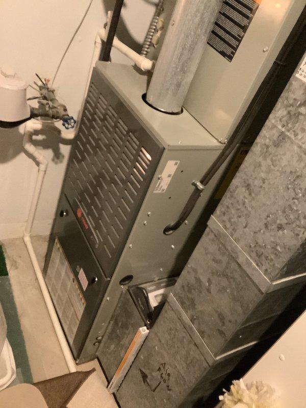 Performed estimate for replacement of 10-year-old Trane furnace with cracked heat exchanger. Evaluated existing HVAC system installation including furnace, air handler, and associated ductwork and condensate drainage components. Provided multiple replacement options and recommendations to address failed heat exchanger, which poses safety concerns and requires complete unit replacement.
