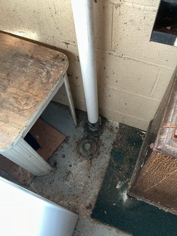 Replaced deteriorating galvanized drain piping and cast iron Durham elbows in basement with new PVC pipe and fittings. Cut into existing vent pipe and adapted to new drainage configuration. Rebuilt and reconfigured kitchen sink drain system in cabinet with new pipe, fittings, and installed air admittance valve. Replaced outdated garbage disposal with new InSinkerator 3/4 HP unit featuring quiet technology. Installed new basket strainer and tubular fittings to connect double bowl sink configuration. Snaked drain line in basement to ensure proper flow and eliminate backup issue.