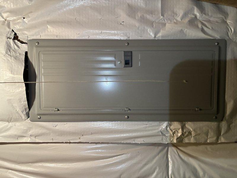 Installed dedicated 240V electrical circuit from main panel to detached garage for EV charger installation. Main 150A panel had no available breaker slots, requiring strategic circuit consolidation to accommodate new 40A double-pole breaker. Ran 8/3 NM-B copper wire approximately 60 feet from panel through attic space to garage location, securing cable per code requirements. Installed NEMA 14-50 receptacle in garage and verified proper voltage, grounding, and circuit functionality. All work completed to current NEC standards for electric vehicle supply equipment circuits.