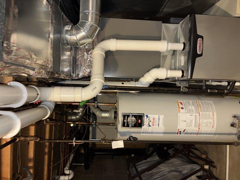 Completed cooling maintenance inspection of residential HVAC system. Inspected air handler unit, ductwork, and air filtration system in mechanical room. Verified air filter condition and confirmed proper airflow through diamond-pattern mesh filter element. System operating within normal parameters.