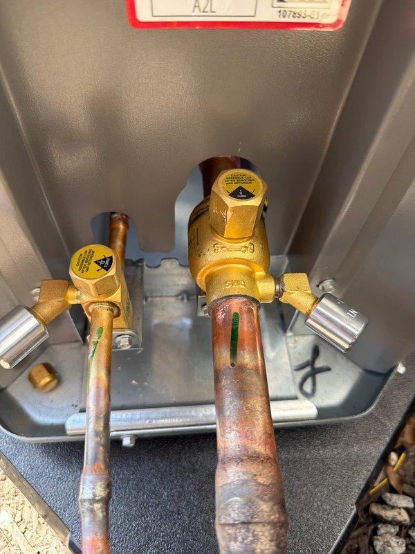 Completed full HVAC system installation including 80% efficiency furnace, air conditioning unit, and hot water heater. Installed new copper refrigerant lines with brass pressure relief valves and proper fittings within the furnace cabinet, ensuring all connections meet code requirements and manufacturer specifications. Replaced electrical fuses with Littelfuse components in the outdoor condensing unit disconnect, verifying proper amperage rating for system protection. All equipment was tested for proper operation, refrigerant levels verified, and safety devices confirmed functional upon completion.