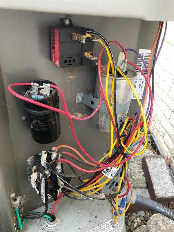 Completed routine maintenance on five-year-old Lennox air conditioning system and furnace. Inspected outdoor condenser unit, verified electrical connections and capacitor operation, cleaned accumulated debris from control panel and concrete pad, and confirmed proper refrigerant line insulation and secure mounting. All systems tested and operating within normal parameters.