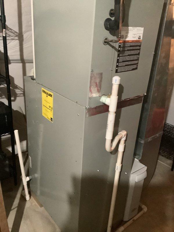 Conducted on-site assessment for furnace replacement in residential basement location. Evaluated existing HVAC equipment configuration, including water heater and associated PVC venting system. Documented current mechanical room layout, equipment positioning, and existing utility connections to prepare comprehensive replacement estimate. Assessed accessibility, clearances, and structural considerations for new furnace installation.
