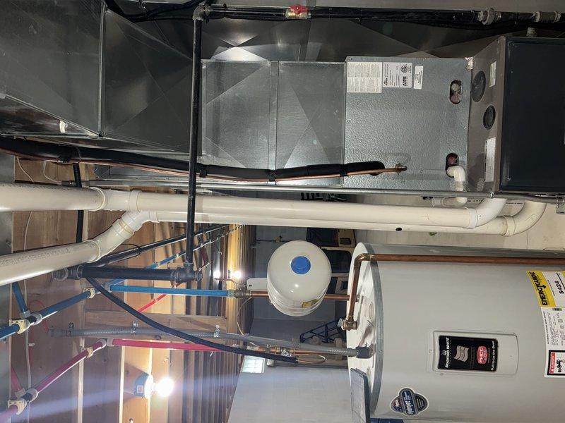 Completed scheduled MVP heating maintenance visit. Performed comprehensive inspection of residential HVAC system including air handler unit, associated condensate drain lines, and humidification equipment. All components found operating within normal parameters with proper airflow and drainage confirmed.