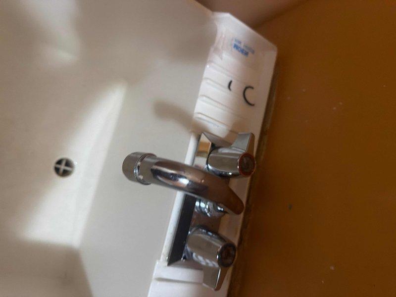 Responded to multi-point plumbing service call addressing drainage and leak issues. Successfully snaked bathtub drain to clear blockage and restore proper water flow. Inspected utility sink in laundry room, identified source of leak, and performed necessary repairs to eliminate water seepage. Conducted thorough inspection of toilet, checking flush mechanism, water supply connections, and shut-off valve operation to ensure proper functionality. Verified all fixtures were operating correctly upon completion, with no active leaks detected and drainage systems flowing properly throughout the property.