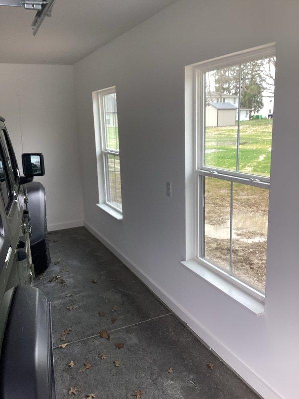 Conducted on-site evaluation for electric vehicle charging station installation in residential garage. Assessed existing electrical panel capacity and determined optimal routing from exterior main service panel to garage location for dedicated EV charger circuit. Customer had pre-purchased charging equipment requiring professional installation and electrical connection to meet code requirements.