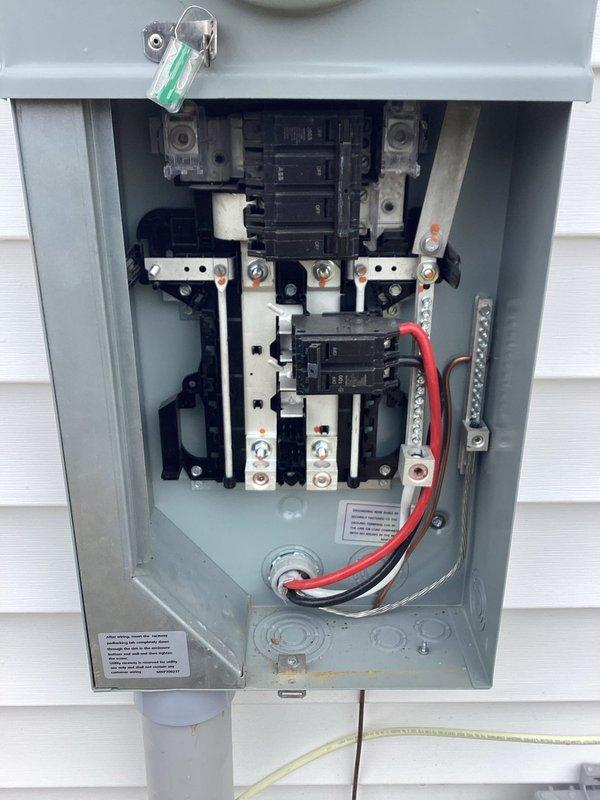 Conducted on-site evaluation for electric vehicle charging station installation in residential garage. Assessed existing electrical panel capacity and determined optimal routing from exterior main service panel to garage location for dedicated EV charger circuit. Customer had pre-purchased charging equipment requiring professional installation and electrical connection to meet code requirements.