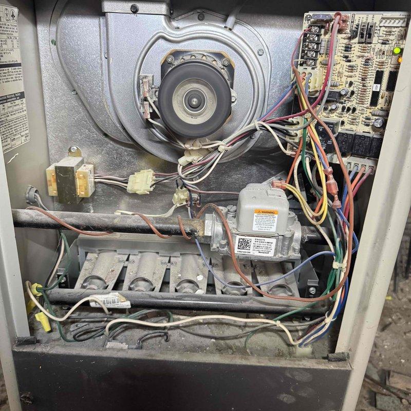 Completed comprehensive tune-up on aging furnace system, performing full inspection of blower motor assembly, heat exchanger, gas valve, and control board with all electrical connections. All components were evaluated for operational condition, and system was tested for proper function. Customer advised that unit is approaching end of service life and replacement estimate may be needed in the near future.