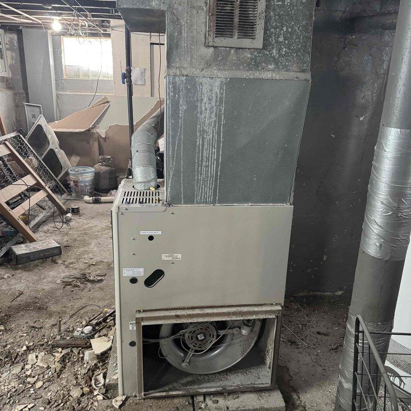 Completed comprehensive tune-up on aging furnace system, performing full inspection of blower motor assembly, heat exchanger, gas valve, and control board with all electrical connections. All components were evaluated for operational condition, and system was tested for proper function. Customer advised that unit is approaching end of service life and replacement estimate may be needed in the near future.