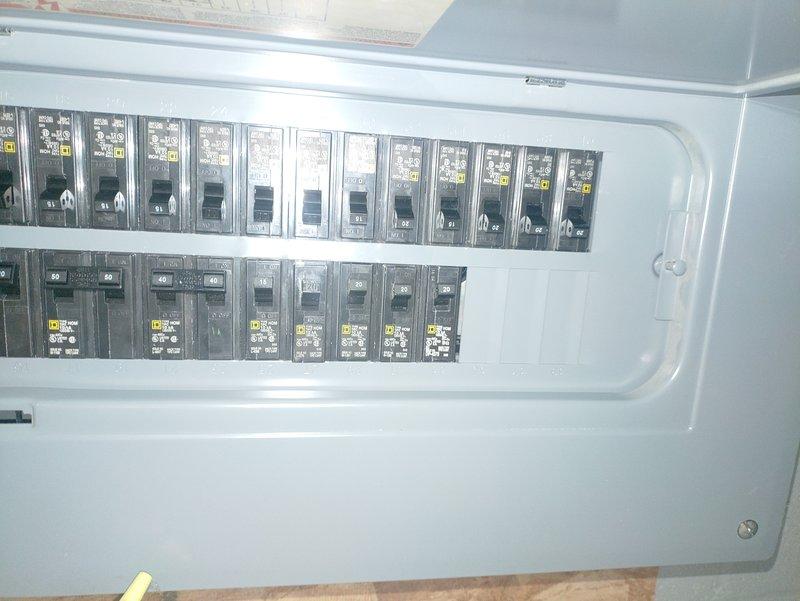 Installed a dedicated 20-amp circuit from the main electrical panel to an unfinished room, routing cable through ceiling joists and wall cavities. Mounted a duplex receptacle outlet in the center of the cinder block wall and connected it to a new circuit breaker in the panel. All materials were provided from truck stock, and the installation was completed to code specifications.