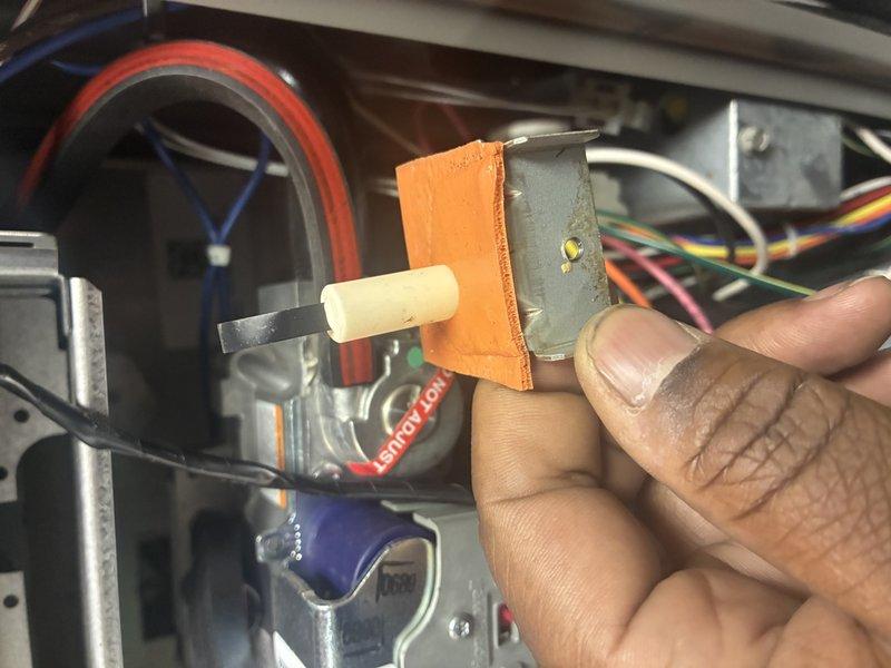 Completed scheduled heating maintenance visit. Inspected and serviced blower motor assembly, examining wear components including roller bushing and foam dampening material for proper operation. Assessed gas line valve and copper piping connections in attic space, noting existing patina on copper lines with valve operating properly.