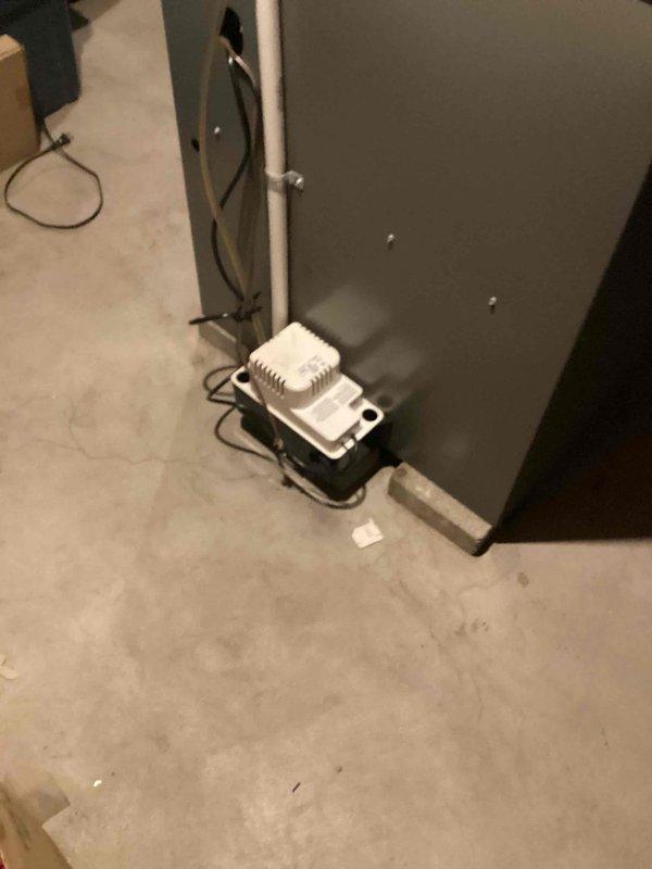 Responded to no-power complaint on 12-year-old air conditioning system. Upon arrival, confirmed complete loss of electrical power to outdoor condensing unit. Performed diagnostic evaluation and determined issue originated at main electrical panel rather than equipment failure. Advised customer that licensed electrician needed to inspect and repair breaker circuit, as problem was beyond scope of HVAC service. Documented system condition with photos showing indoor air handler, refrigerant lines with insulation, condensate management components, and auxiliary equipment in utility space.