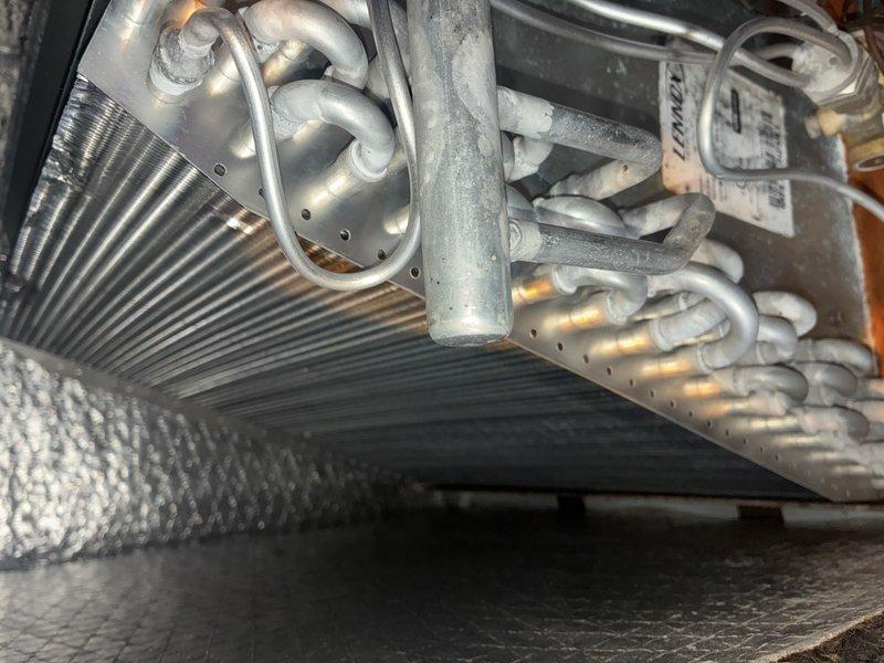 Completed routine air conditioning maintenance under prepaid MVP plan. Inspected evaporator coil and refrigerant lines, confirmed proper operation of all components. Replaced pleated air filter which showed moderate dust accumulation from normal use. System operating within manufacturer specifications with no deficiencies noted.