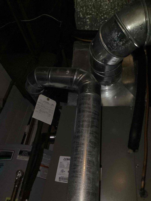 Responded to no heat call on 9-year-old natural gas furnace. Customer reported thermostat temperature dropping despite furnace console displaying 70°F, with audible ignition attempts but no successful startup. Upon inspection, accessed furnace cabinet and examined blower motor assembly, electrical connections, and gas valve components. Verified all wire terminations at motor and control board were secure. Inspected inducer motor operation and venting system for proper draft. Checked gas valve for proper voltage supply and confirmed gas line pressure. Tested ignition sequence and flame sensor operation. Identified issue preventing successful ignition cycle. Cleaned flame sensor rod and verified proper microamp reading. Cycled system multiple times to confirm reliable ignition and sustained operation. Verified proper airflow through heat exchanger and ductwork connections. System restored to normal heating operation with thermostat responding appropriately to temperature calls.