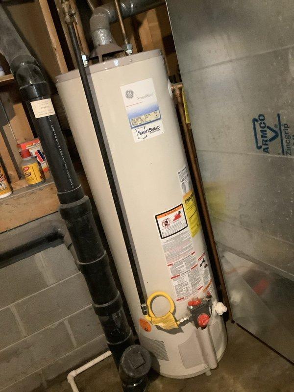 Responded to service call for main drain line blockage. Upon arrival, accessed cleanout in basement utility area and assessed drainage system. Customer reported suspected clog in main line before connection to street. Performed initial inspection of accessible drain lines and cleanout access points. Documented existing plumbing configuration including PVC drainage system and basement utility setup for potential camera inspection if blockage persists or recurs.