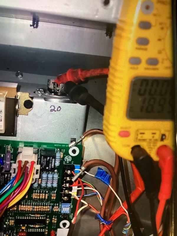 Completed recurring maintenance visit on heating system. Performed thorough inspection of blower assembly, observing accumulated dust and debris on squirrel cage fan blades. Conducted electrical diagnostics on control board using digital multimeter to verify proper voltage readings and system operation across all circuits and connections.