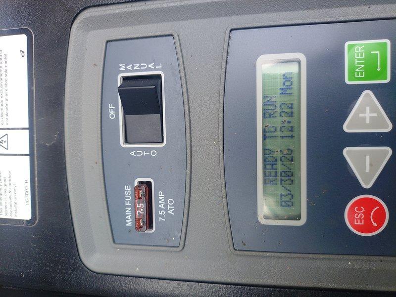 Responded to service call for generator experiencing starting difficulties. Upon inspection, diagnosed issue requiring replacement part to restore proper operation. Documented control panel configuration showing main power switch, 7.5 amp main fuse, and digital display interface with operational controls. Advised property owner to monitor system and contact for follow-up service if starting problems continue.