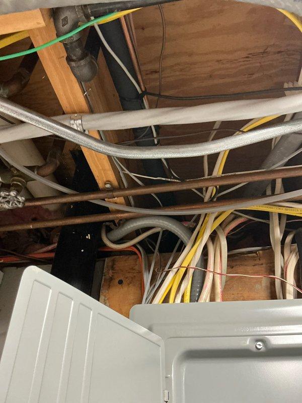 Completed on-site evaluation for furnace replacement estimate at residential property. Assessed existing HVAC system including air handler unit located in basement or mechanical room, inspected refrigerant line routing through attic space, and evaluated condensate drainage system with existing pump configuration. Documented current equipment specifications, ductwork connections, and utility routing to provide comprehensive replacement recommendations.