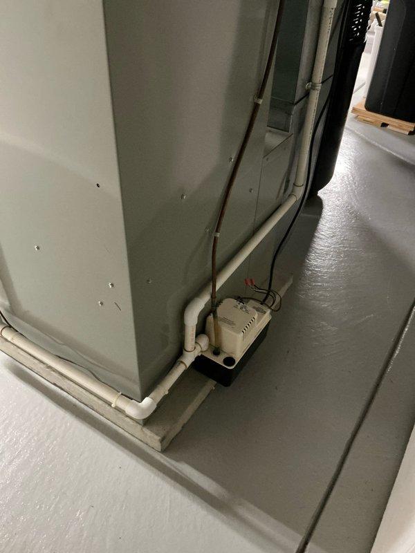 Completed on-site evaluation for furnace replacement estimate at residential property. Assessed existing HVAC system including air handler unit located in basement or mechanical room, inspected refrigerant line routing through attic space, and evaluated condensate drainage system with existing pump configuration. Documented current equipment specifications, ductwork connections, and utility routing to provide comprehensive replacement recommendations.