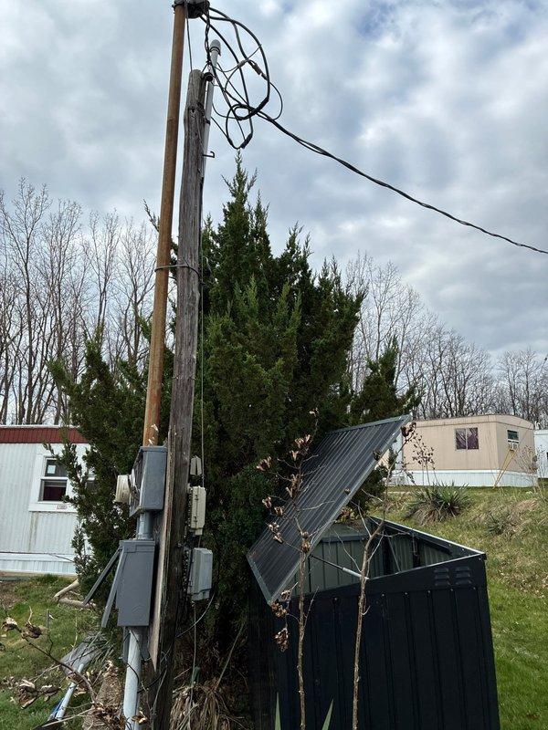 Removed existing 4-meter base combo assembly and three associated disconnects from the property. Retained and reconnected the disconnect labeled as unit 24. Installed new meter base and riser assembly, establishing proper connection to overhead power lines. Successfully re-energized the remaining disconnect, restoring electrical service to the structure.