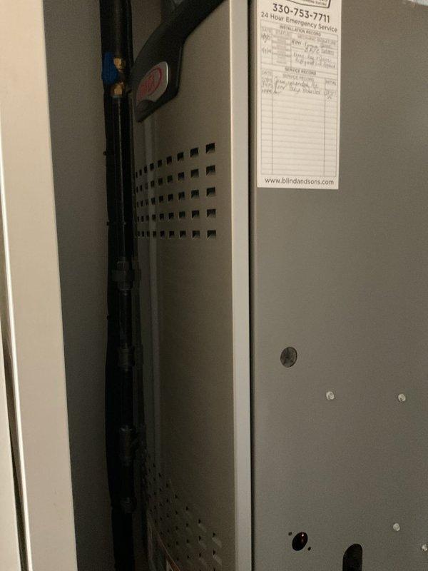 Completed MVP recurring heating maintenance visit on 2-year-old gas furnace. Performed comprehensive furnace maintenance inspection including visual examination of all accessible components. Installed customer-supplied air filter to ensure proper airflow and system efficiency. Inspected interior cabinet components, blower assembly, and heat exchanger through access panels. Verified all electrical connections, capacitor mounting, and control wiring at outdoor condensing unit showing proper color-coded terminations and secure wire management. All systems operating within normal parameters with no deficiencies noted.