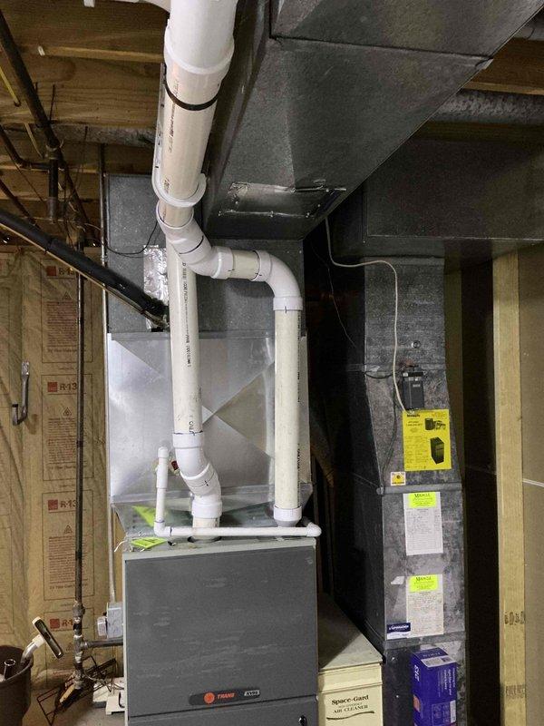 Performed on-site estimate for furnace replacement due to cracked heat exchanger in 17-year-old unit. Assessed existing HVAC system configuration in basement mechanical room, documented equipment condition with photographs, and provided quote for complete furnace replacement with new high-efficiency unit and associated components including PVC venting system.