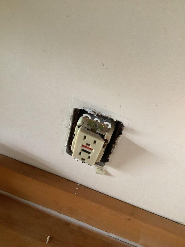 Responded to service call for non-functioning kitchen outlets. Upon arrival, found GFI outlet requiring replacement along with three additional outlets without power. Inspected electrical panel and discovered severe rust and corrosion on main breaker base plate, indicating moisture intrusion that compromised electrical connections. Replaced defective GFI outlet and restored power to affected circuits. Documented extensive panel corrosion for future remediation, as deteriorated condition poses potential safety hazard requiring panel replacement or comprehensive repair.