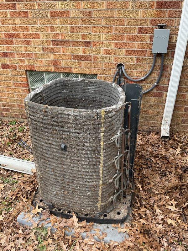 Completed routine preventive maintenance visit on residential cooling system for MVP customer. Inspected outdoor condenser unit and coil assembly, noting accumulated debris and seasonal leaf buildup around equipment requiring attention for optimal airflow and system efficiency. Verified electrical connections, disconnect box functionality, and condensate drain line operation with all components found in serviceable condition.