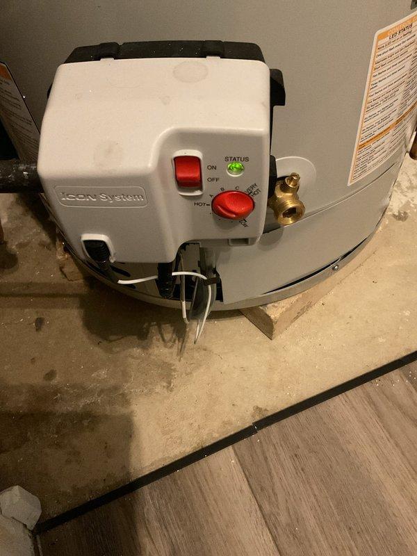 Replaced existing 50-gallon power vent water heater with new Bradford White 40-gallon power vent unit. Installation included new water shut-off valve with brass compression fittings on copper supply lines and thermal expansion tank to protect against pressure buildup. Mounted FCON control system on unit with status indicator and temperature control. All connections properly secured and tested for leaks. Unit carries 6-year tank warranty and is fully operational.