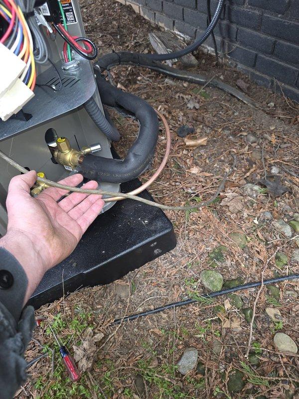 Responded to no cooling call with thermostat displaying E107 error code following recent PCB installation. Upon inspection, discovered severely corroded copper refrigerant line at outdoor unit, indicating moisture intrusion and potential refrigerant leak. Performed system diagnostics, checked electrical connections at control board, and assessed refrigerant line integrity to determine root cause of thermostat communication failure and system malfunction.